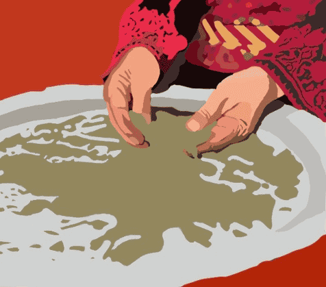 Femme préparant du Zaatar